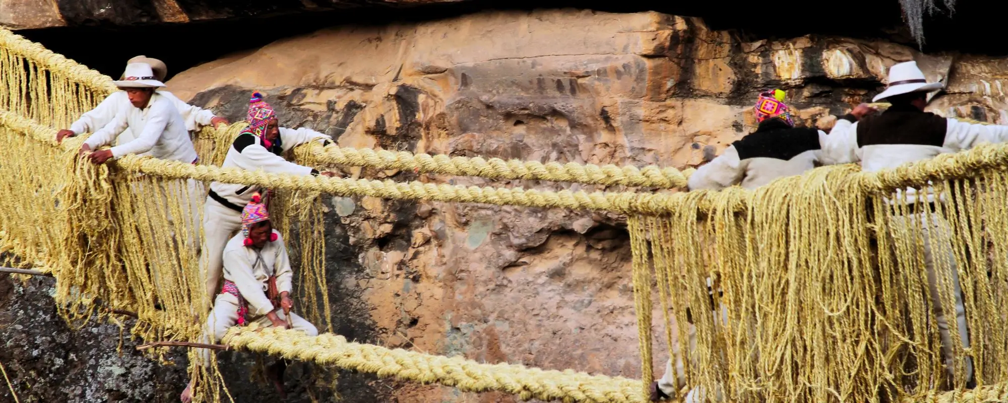 inca suspension bridge made of grass in Peru